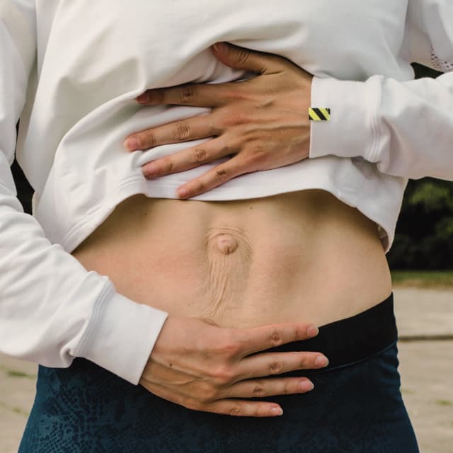 Close-up showing diastasis recti abdominal separation