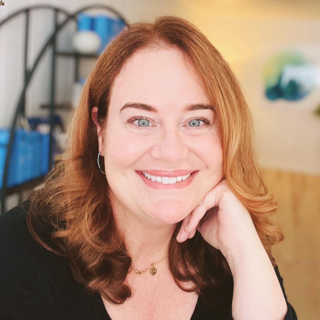 Katy Turville smiling warmly, master esthetician at Next OV Skin